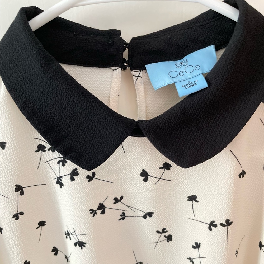 Cece black & white professional top. Size small.